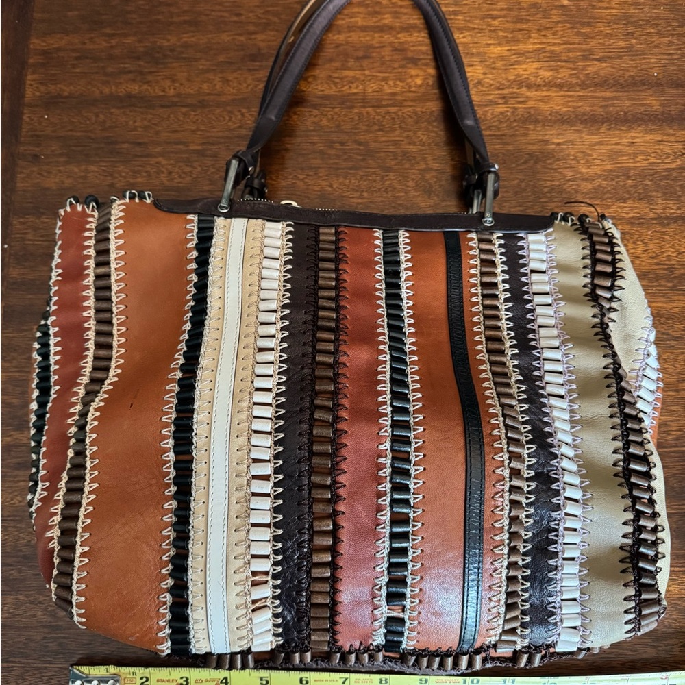 Leather Patchwork Striped Shoulder Bag from Paris-based designers